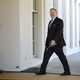 Spicer, pictured striding forward like a suit-clad gazelle. (Photo: Chip Somodevilla/Getty Images)
